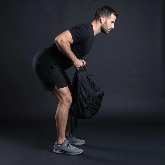A person doing backpack rows