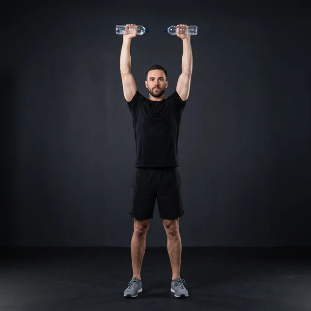 A person doing bottle shoulder press