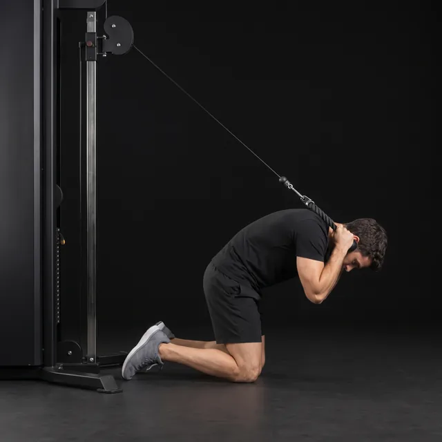 A person doing cable crunches
