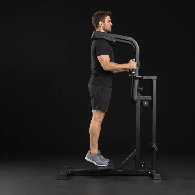 A person doing calf raise machine