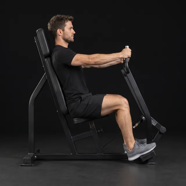 A person doing chest press machine