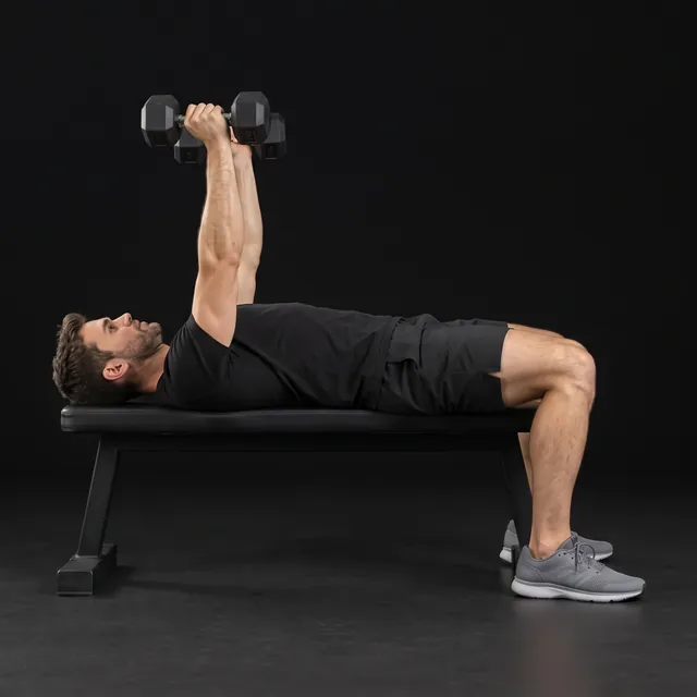 A person doing dumbbell bench press