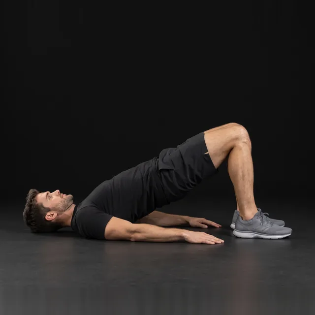 A person doing glute bridges
