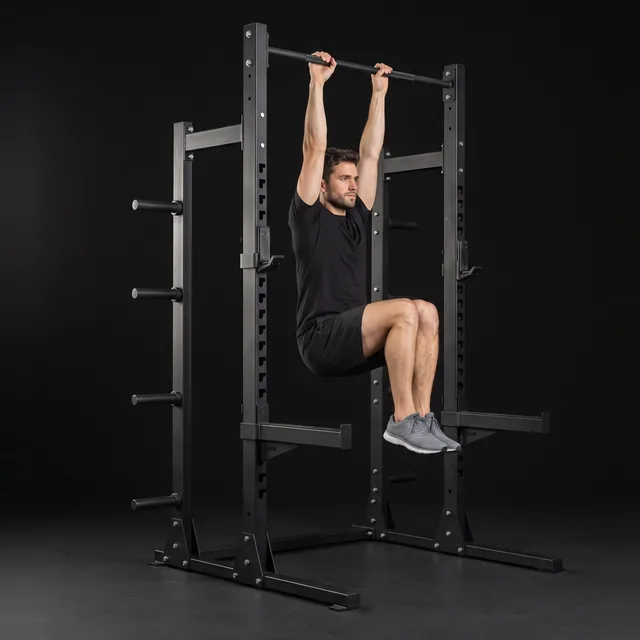 A person doing hanging knee raises
