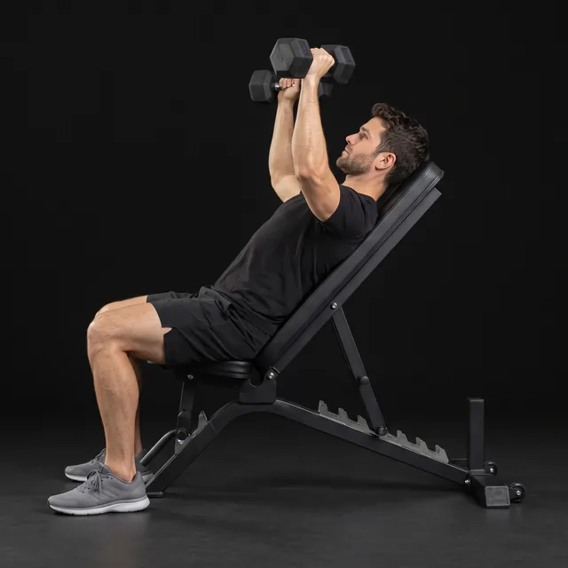 A person doing incline dumbbell press