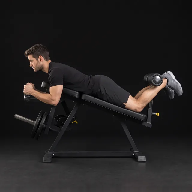 A person doing leg curl machine