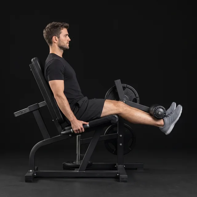 A person doing leg extension machine
