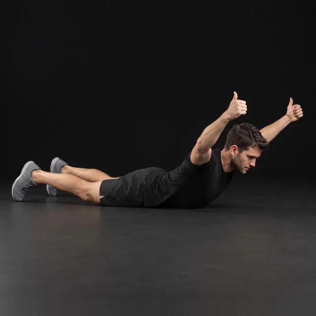 A person doing prone y raises