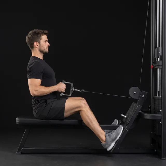 A person doing seated cable row