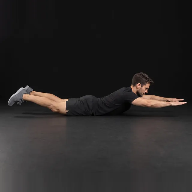 A person doing superman hold